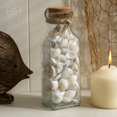 Glass Bottle with Decorative Shells and Cork