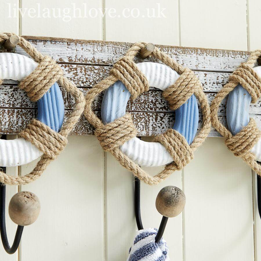 https://www.livelaughlove.co.uk/cdn/shop/products/large-nautical-life-buoy-driftwood-wall-hooks-5-hook-881013_1400x.jpg?v=1675248035